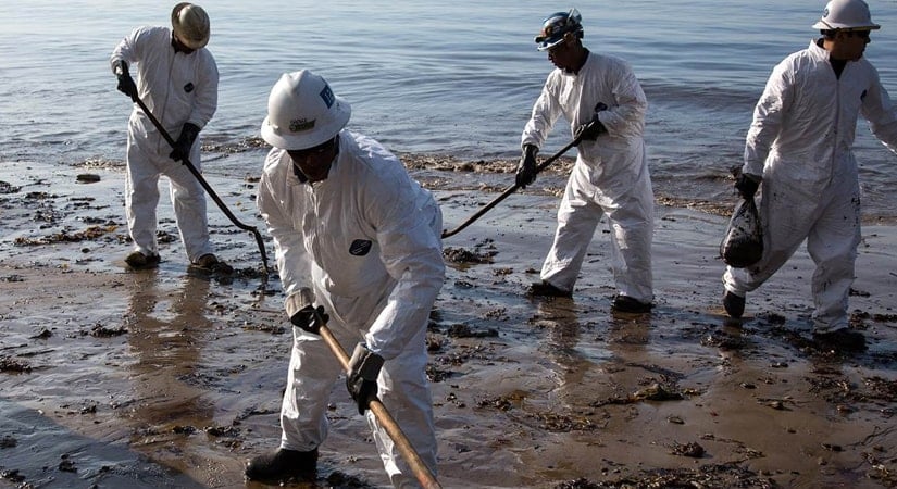 Crews race to clean the beaches after an oil spill near Santa Barbara